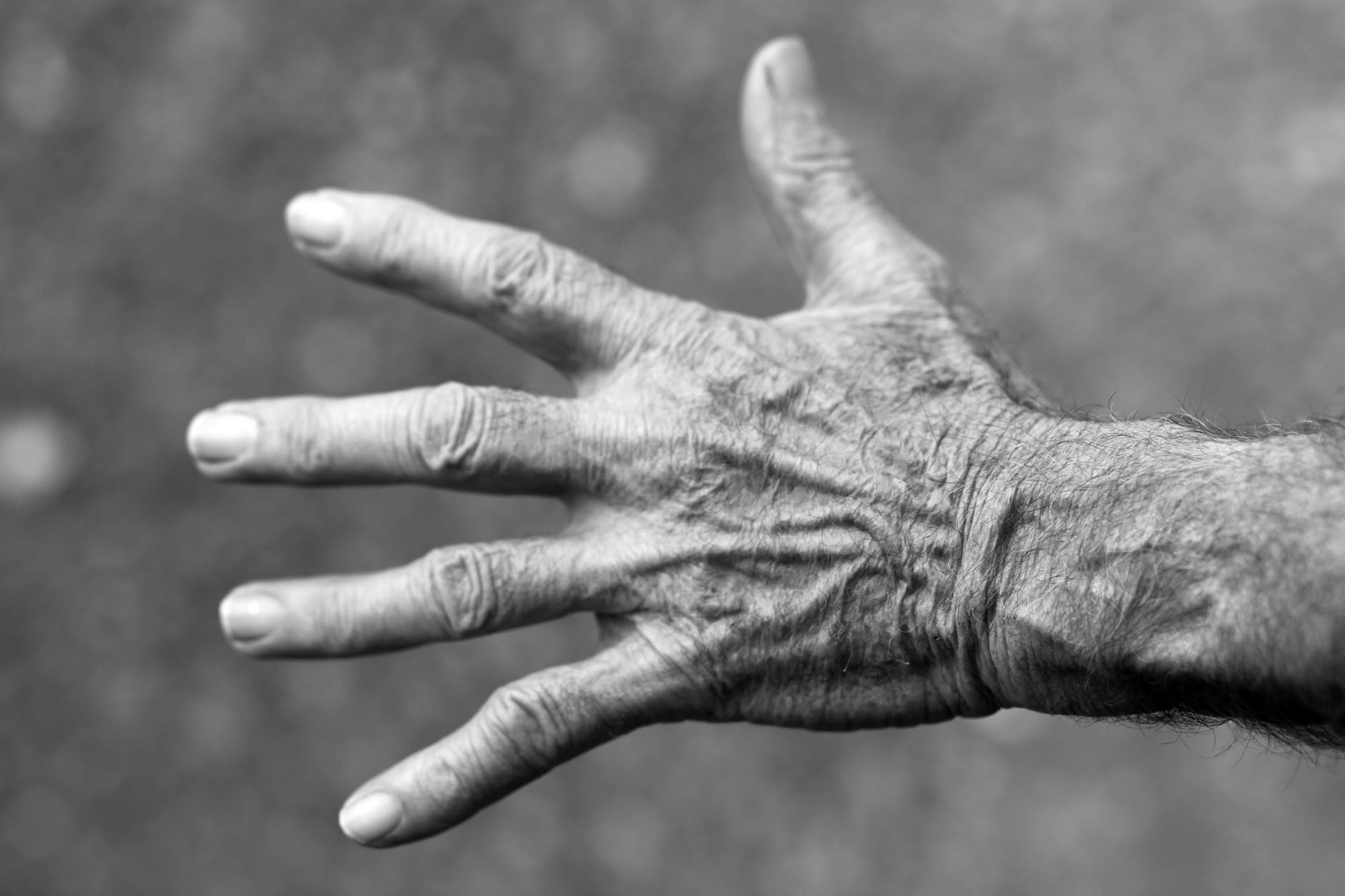 hand wrinkles black and white elderly woman