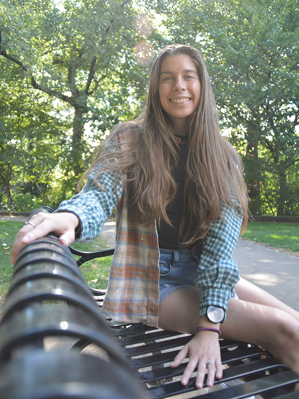 Amber sitting on park bench